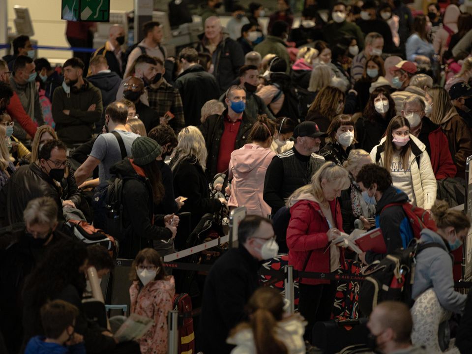 Passengers queuing at Dublin Airport on April 1. Photo: Mark Condren