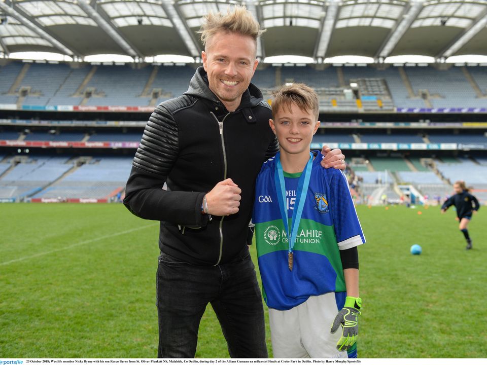 23 October 2018; Westlife member Nicky Byrne with his son Rocco Byrne from St. Oliver Plunkett NS, Malahide, Co Dublin, during day 2 of the Allianz Cumann na mBunscol Finals at Croke Park in Dublin. Photo by Harry Murphy/Sportsfile 