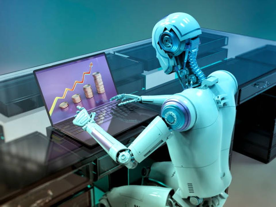 Humanoid robot working on laptop studying financial chart, conceptual computer illustration