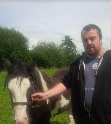 Mark Henry with a horse
