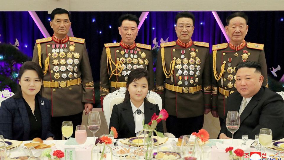 Kim with his daughter Kim Ju Ae and his wife Ri Sol Ju at the banquet