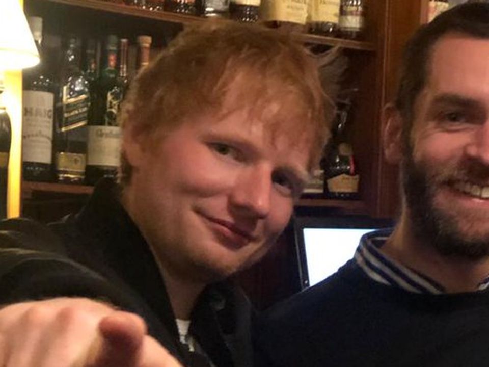 Ed Sheeran posing for a photo in Fitzgeralds of Sandycove (Twitter)