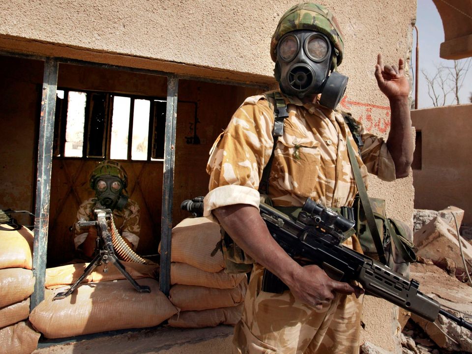 British soldiers wearing gas masks similar to those allegedly stolen by Lyndon Mort and his wife Leona