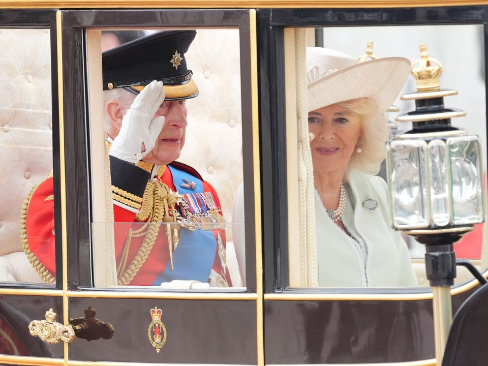 The King and Queen travel along The Mall to the Trooping the Colour ceremony (Jonathan Brady/PA)