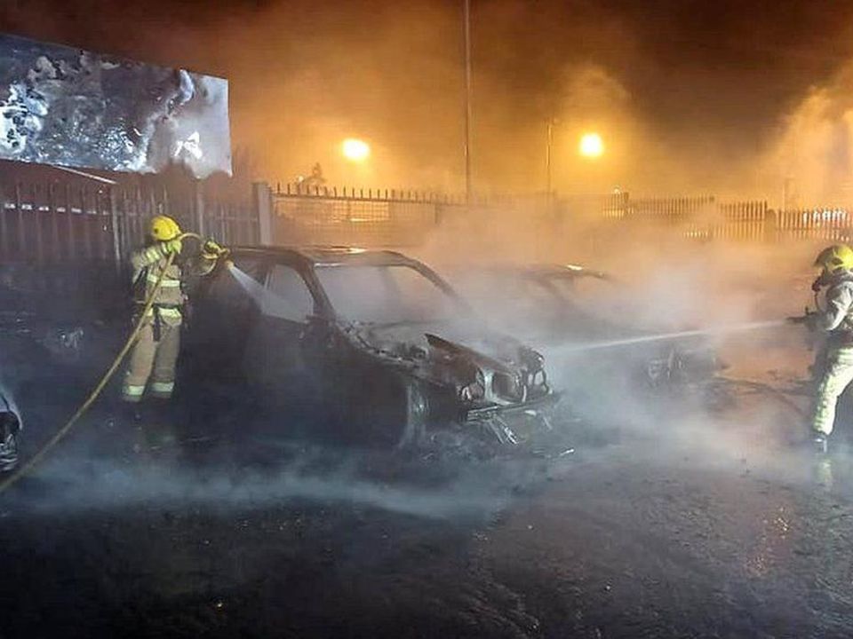 Firefighters tackle the blaze. Photo: NIFRS