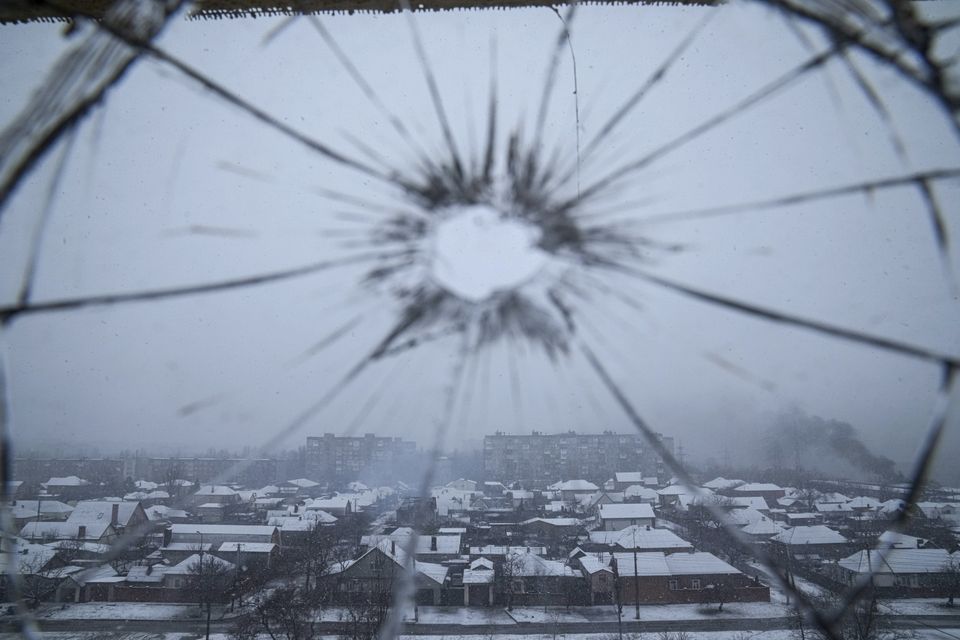 Glass on a hospital window is shattered by shelling in Mariupol, Ukraine (Evgeniy Maloletka/AP)