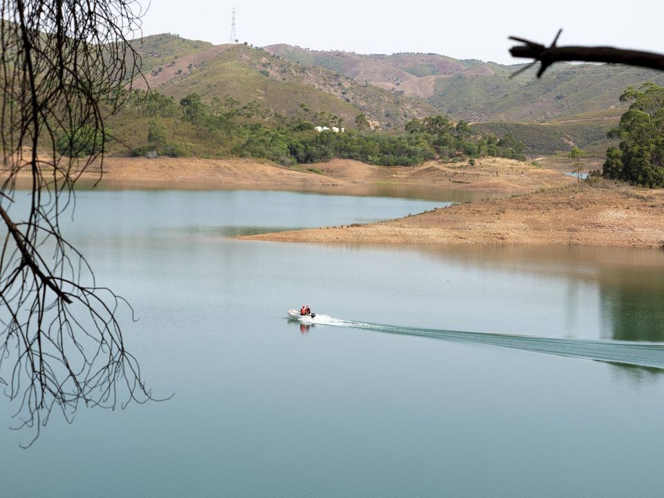 Underwater divers search for evidence at Barragem reservoir, Portugal, yesterday. Photo: Solarpix