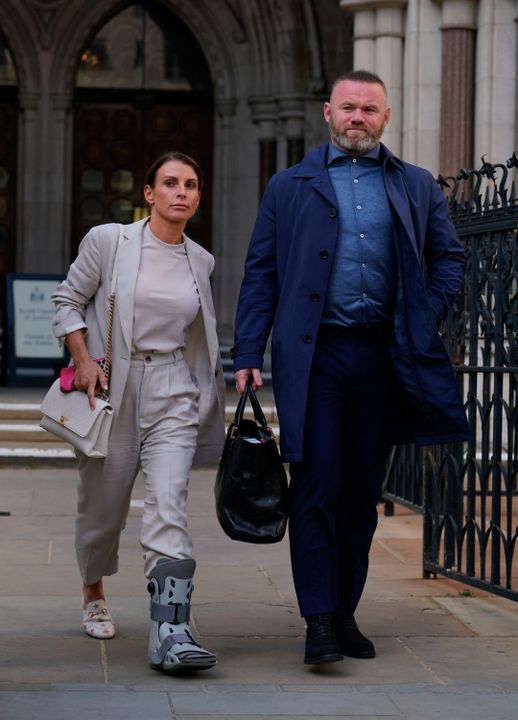 Coleen and Wayne Rooney leave the Royal Courts Of Justice, London during high-profile libel battle between Rebekah Vardy and Coleen Rooney. Picture date: Friday May 13, 2022. PA Photo.
