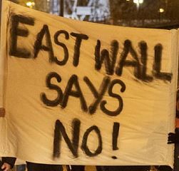 Sign held up by protesters in East Wall, Dublin