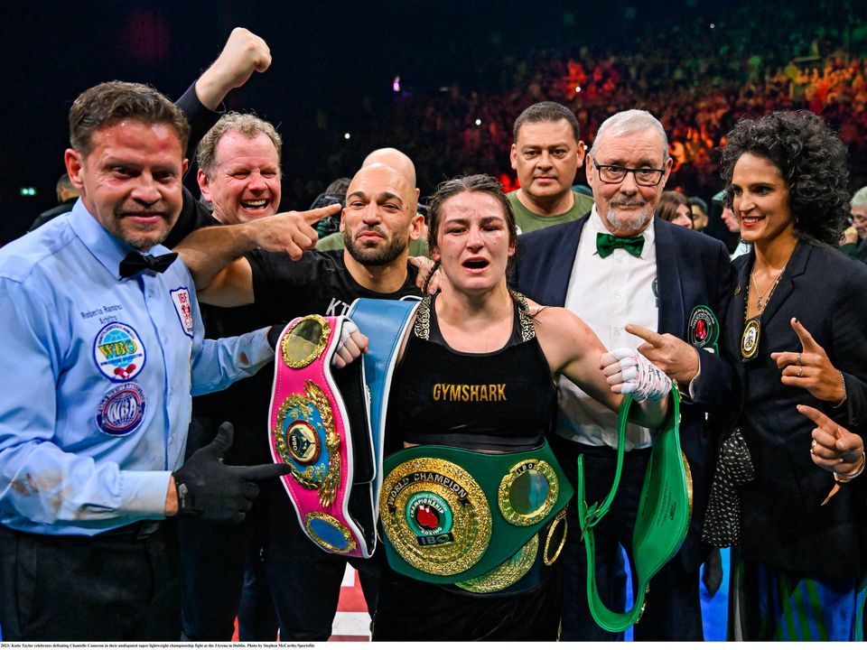 25 November 2023; Katie Taylor celebrates defeating Chantelle Cameron in their undisputed super lightweight championship fight at the 3Arena in Dublin. Photo by Stephen McCarthy/Sportsfile