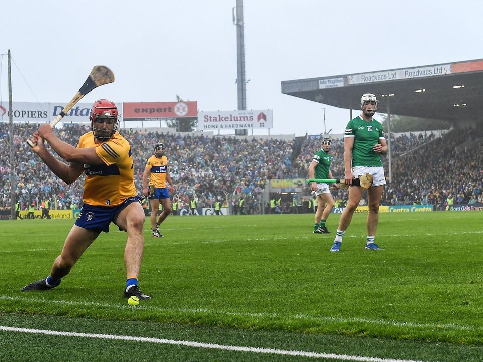 Peter Duggan of Clare takes a sideline cut during the Munster final against Limerick.