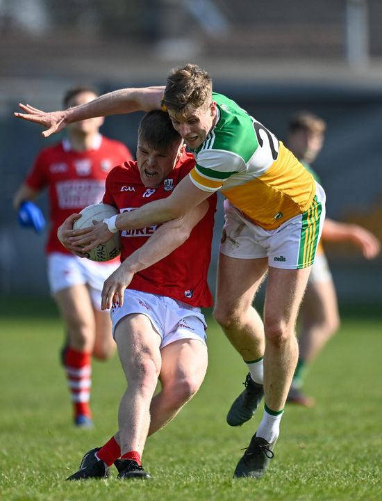 Luke Fahy of Cork in action against Johnny Moloney of Offaly