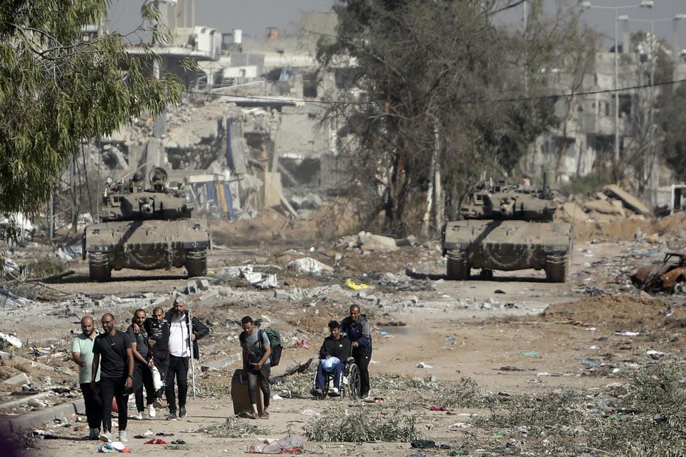 Palestinians flee to northern Gaza (Mohammed Dahman/AP)