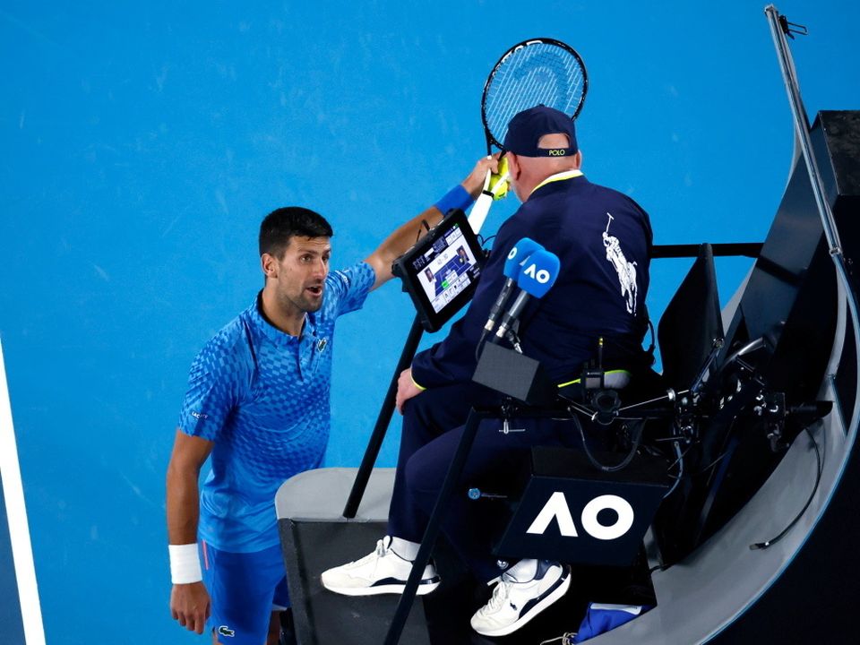 Novak Djokovic argues with chair umpire Fergus Murphy during his second round match. (AP Photo/Asanka Brendon Ratnayake)