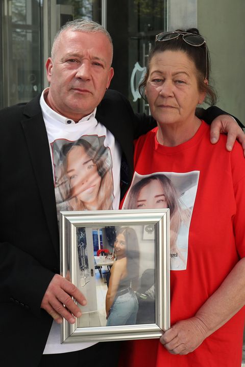 Joe and Jackie Poole, the parents of murdered woman, Jennifer Poole, hold a framed photo of her, outside Central Criminal Court where Gavin Murphy received a life sentence for murdering Jennifer, in April 2021. PIC: Collins Courts