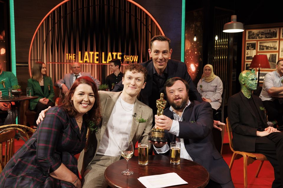 Ryan Tubridy with Lisa McGee, and An Irish Goodbye Oscar winners, director Ross White and James Martin on The Late Late Show. Photo: Andres Poveda