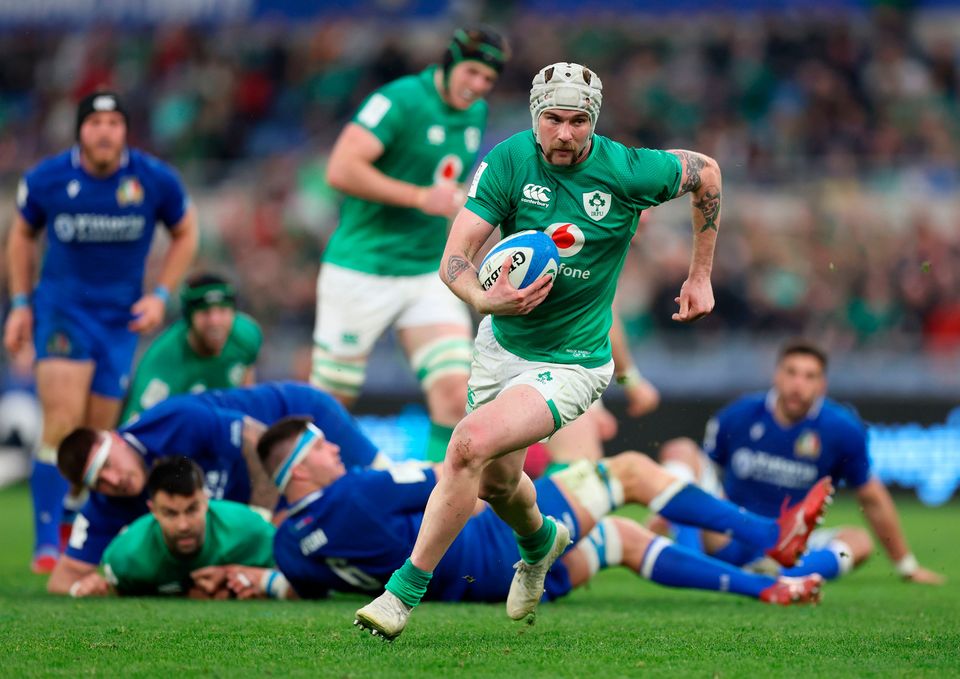 Mack Hansen on his way to scoring Ireland's fifth try : Photo: Steven Paston/PA Wire.