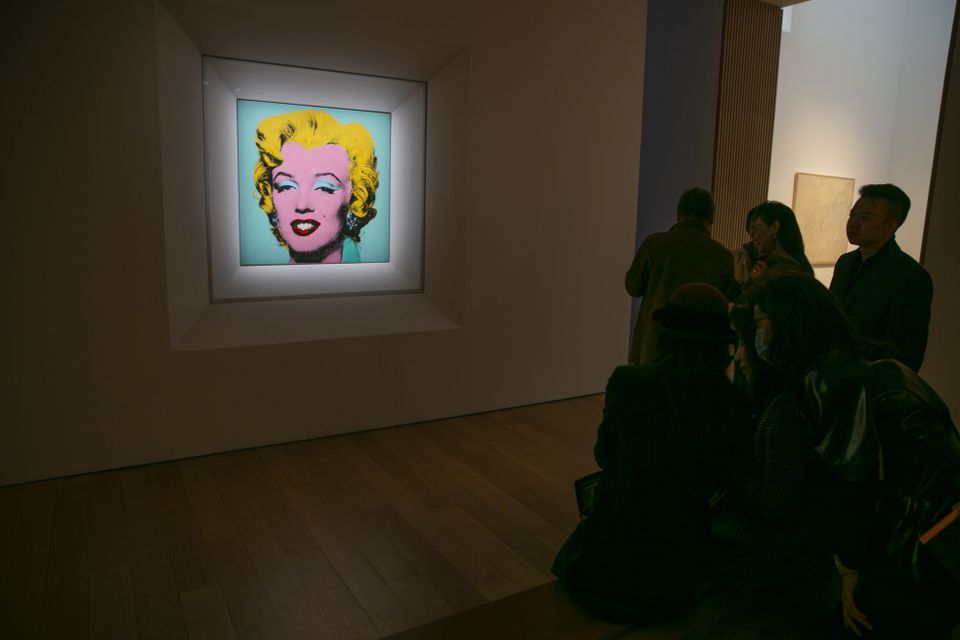 Andy Warhol’s portrait is also the most expensive piece from the 20th century ever to be sold at auction, according to Christie’s auction house (Ted Shaffrey/AP)