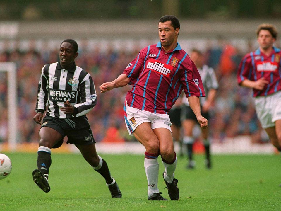 Aston Villa defender Paul McGrath chases down Ruel Fox of Newcastle United with Ireland team-mate Andy Townsend (far right) close by during a Premier League clash 
in 1994. Photo: Clive Brunskill/allsport