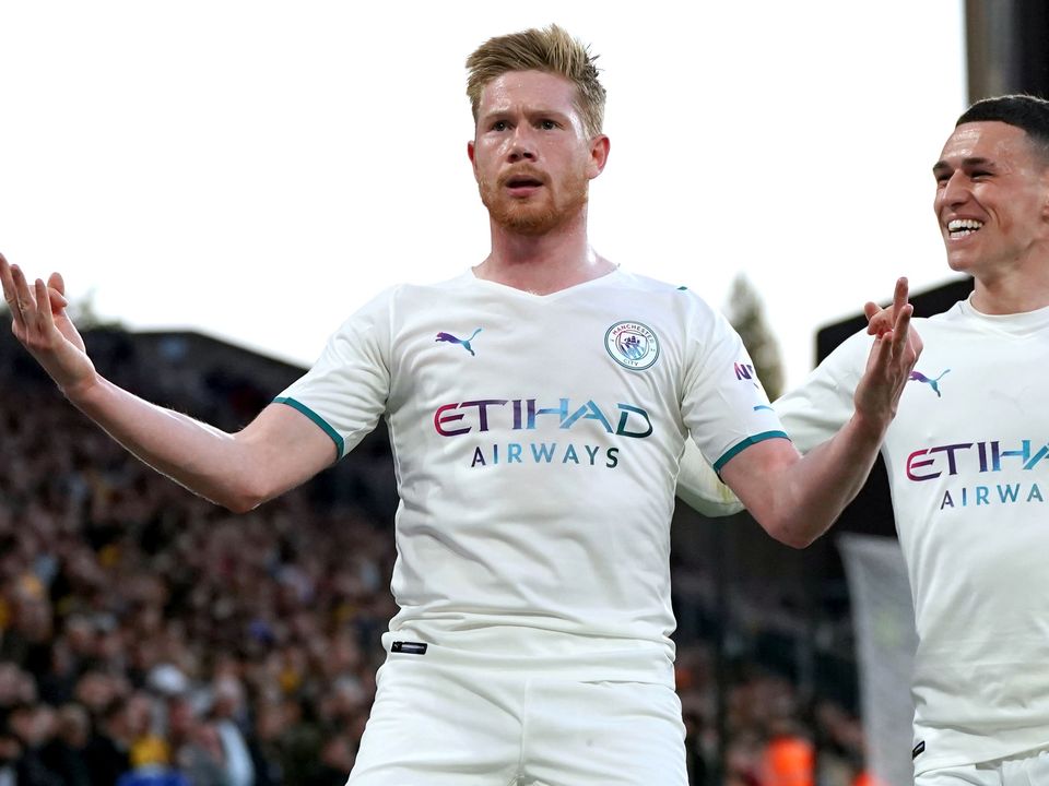 Kevin De Bruyne, left, scored four times as Manchester City thrashed Wolves to move closer to title success (Nick Potts/PA)