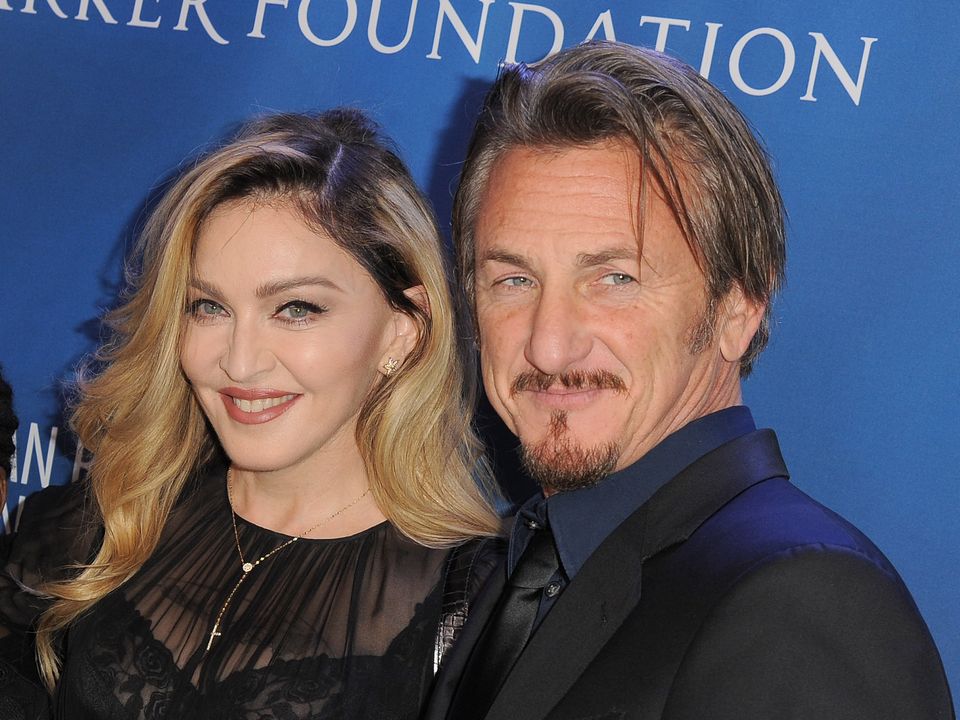 Musician Madonna and actor Sean Penn   (Photo by Angela Weiss/Getty Images)