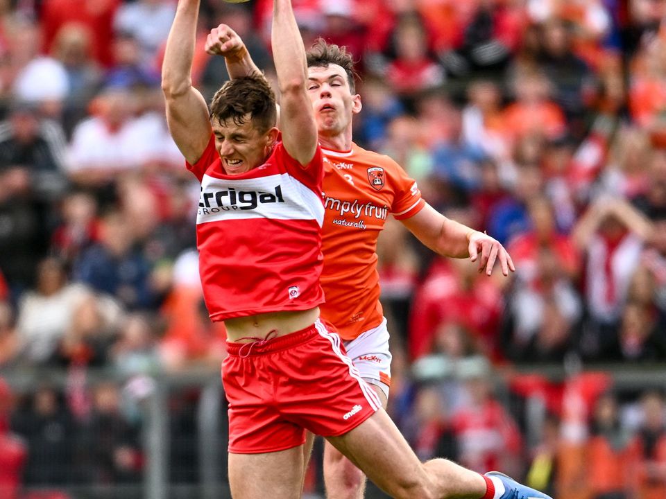14 May 2023; Shane McGuigan of Derry in action against Barry McCambridge of Armagh during the Ulster GAA Football Senior Championship Final match between Armagh and Derry at St Tiernach’s Park in Clones, Monaghan. Photo by Ramsey Cardy/Sportsfile