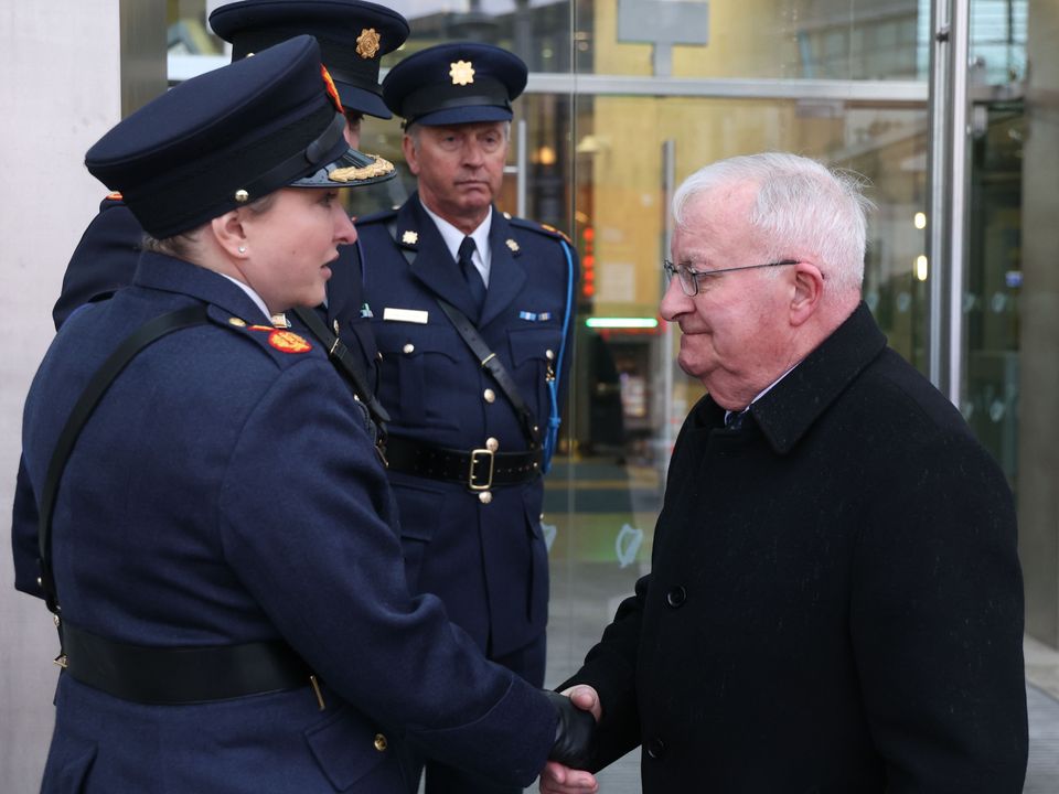 Deputy Commissioner Shawna Coxon speaking to Marty Horkan, father of Detective Garda Colm Horkan, outside the Criminal Courts of Justic