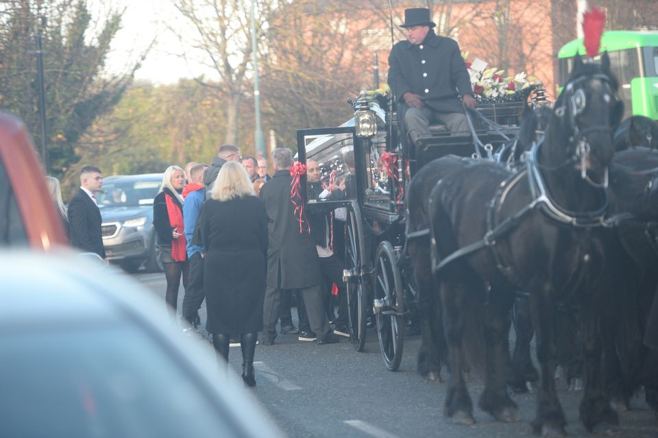 Mourners at the funeral of Brandon Ledwidge