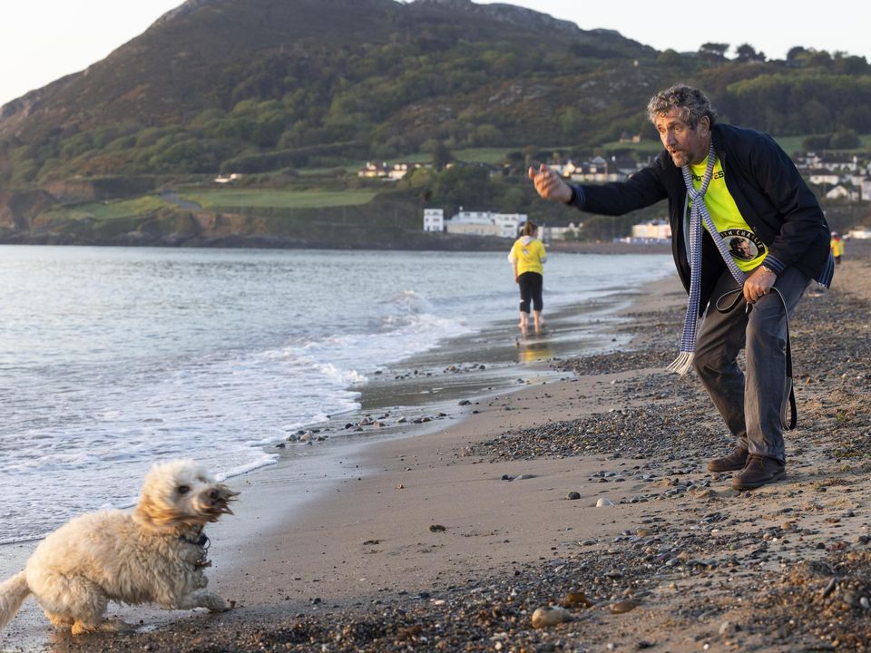 Charlie Bird and his dog Tiger after taking part in Bray's Darkness Into Light walk. Photo: Fergal Phillips
