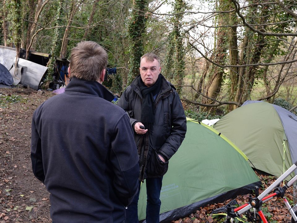 Sunday World's Eugene Masterson talking to people at the site
