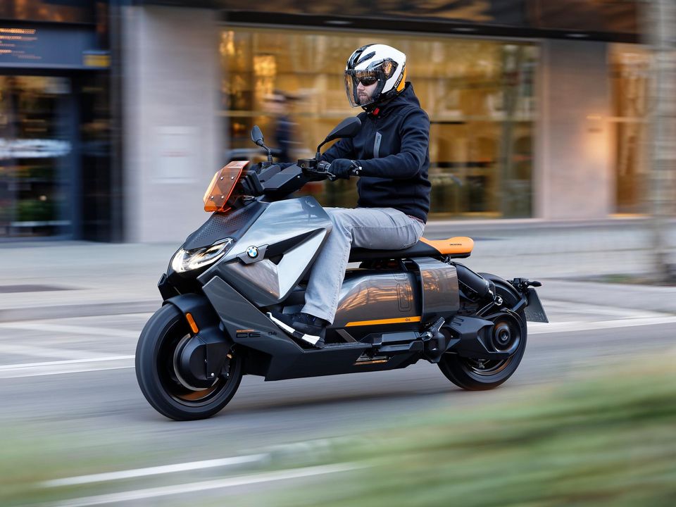 You can connect to the BMW CE 04 , via a phone and on to a comms kit in the rider’s helmet