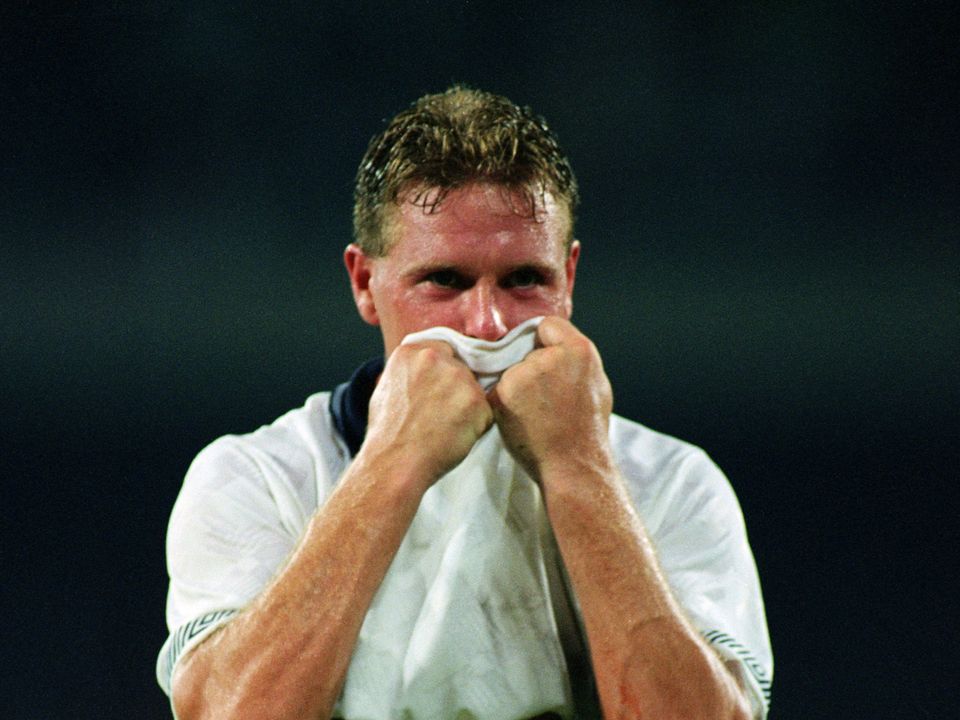 Paul Gascoigne of England lifts his shirt to his face during the 1990 World Cup in Naples, Italy.