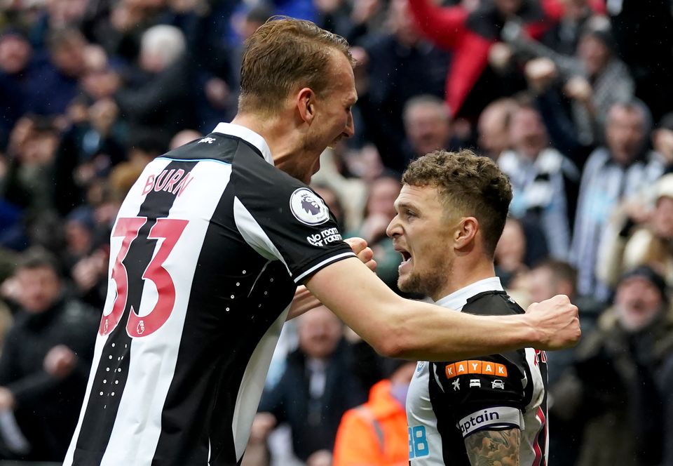 Newcastle’s Kieran Trippier (right) celebrates his winning goal against Aston Villa with team-mate Dan Burn (Owen Humphreys/PA)