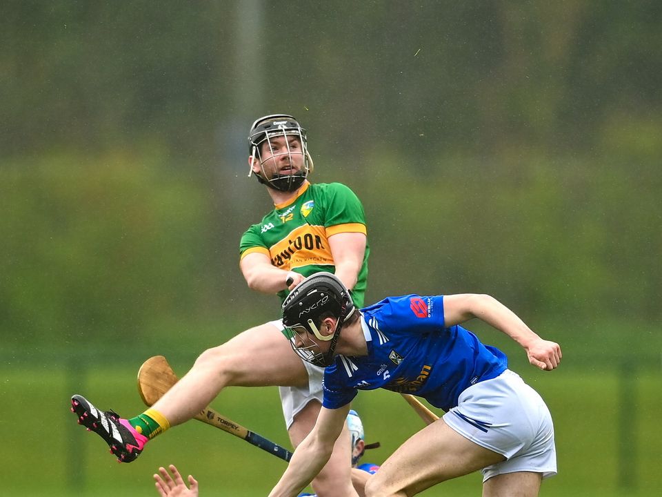 1 April 2023; Seán O'Riordain of Leitrim in action against Jack Barry, right, and Rory Farrell of Cavan during the Allianz Hurling League Division 3B Final match between Cavan and Leitrim at GAA National Games Development Centre in Sport Ireland Campus in Dublin. Photo by David Fitzgerald/Sportsfile