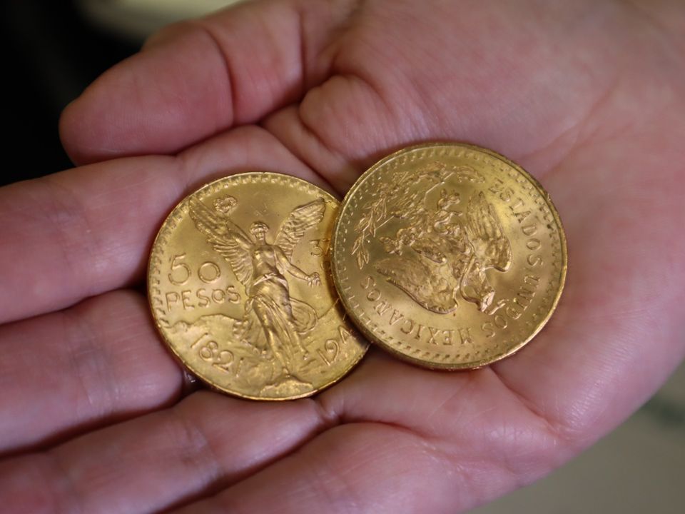 The coins are Mexican pesos dated to 1947. Photo: Kenny's bookshop.