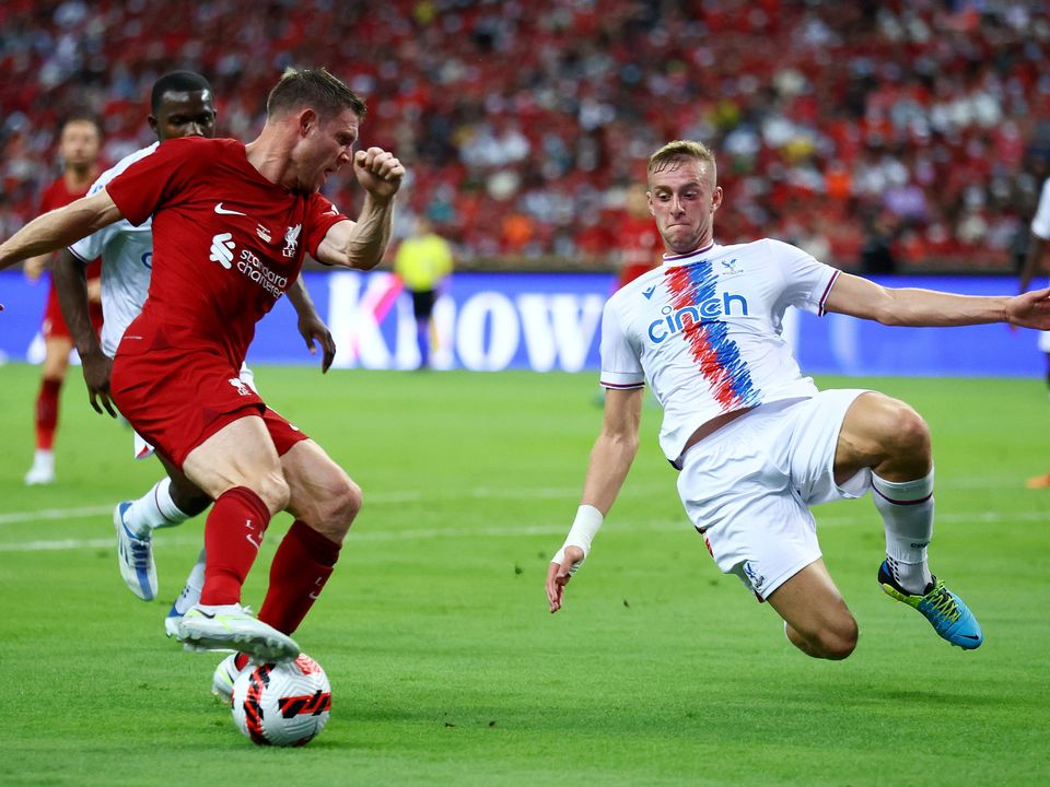  James Milner #7 of Liverpool controls the ball against Killian Phillips #55 of Crystal Palace during the first half of their preseason friendly at the National Stadium on July 15, 2022 in Singapore. (Photo by Yong Teck Lim/Getty Images)