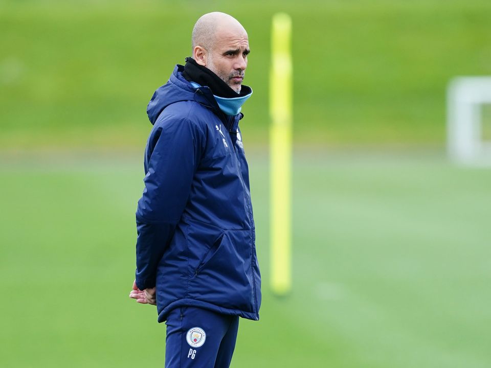 Pep Guardiola feels like Manchester City are now ‘serving’ for the title (Martin Rickett/PA)