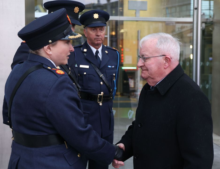 Deputy Commissioner Shawna Coxon speaking to Marty Horkan, father of Detective Garda Colm Horkan, outside the Criminal Courts of Justic