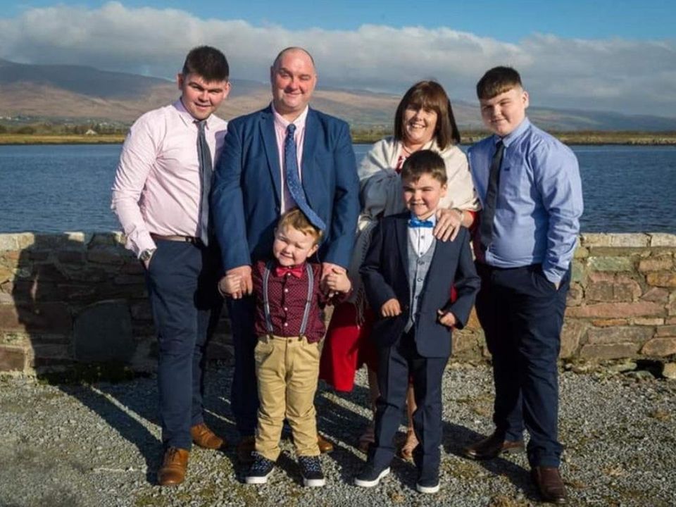 The four Clifford brothers Patrick, Jack, Conor and Andrew, pictured with their parents in happier times.