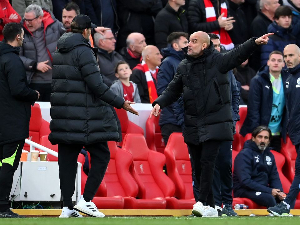 Liverpool manager Jurgen Klopp and Manchester City boss Pep Guardiola exchange words. Photo: Getty Images