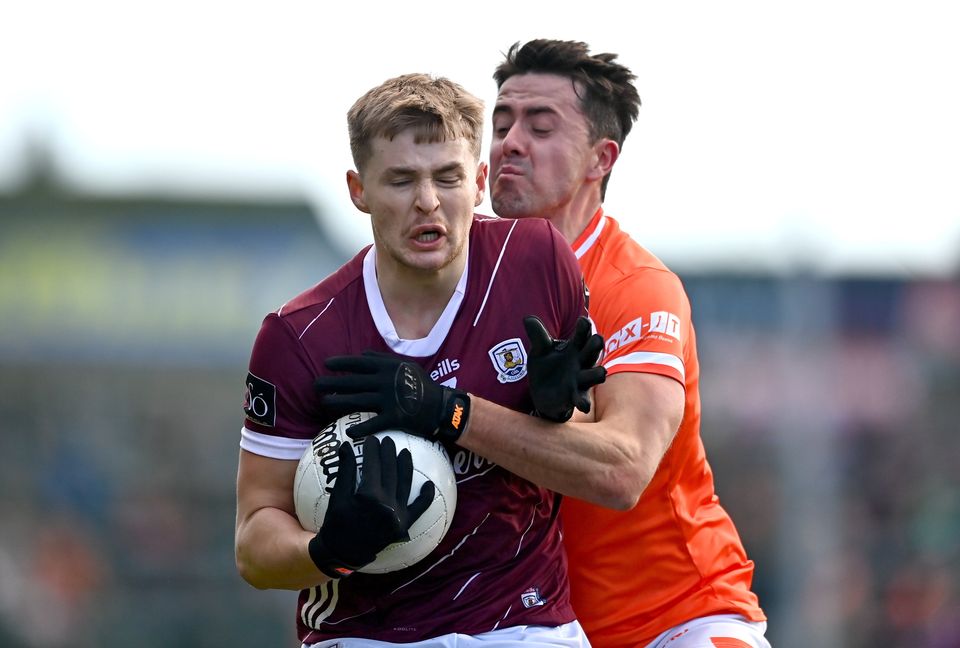 Cian Hernon of Galway is tackled by Stefan Campbell of Armagh, in a game in which the Orchard County only got two points in the second half. Photo: Ben McShane/Sportsfile