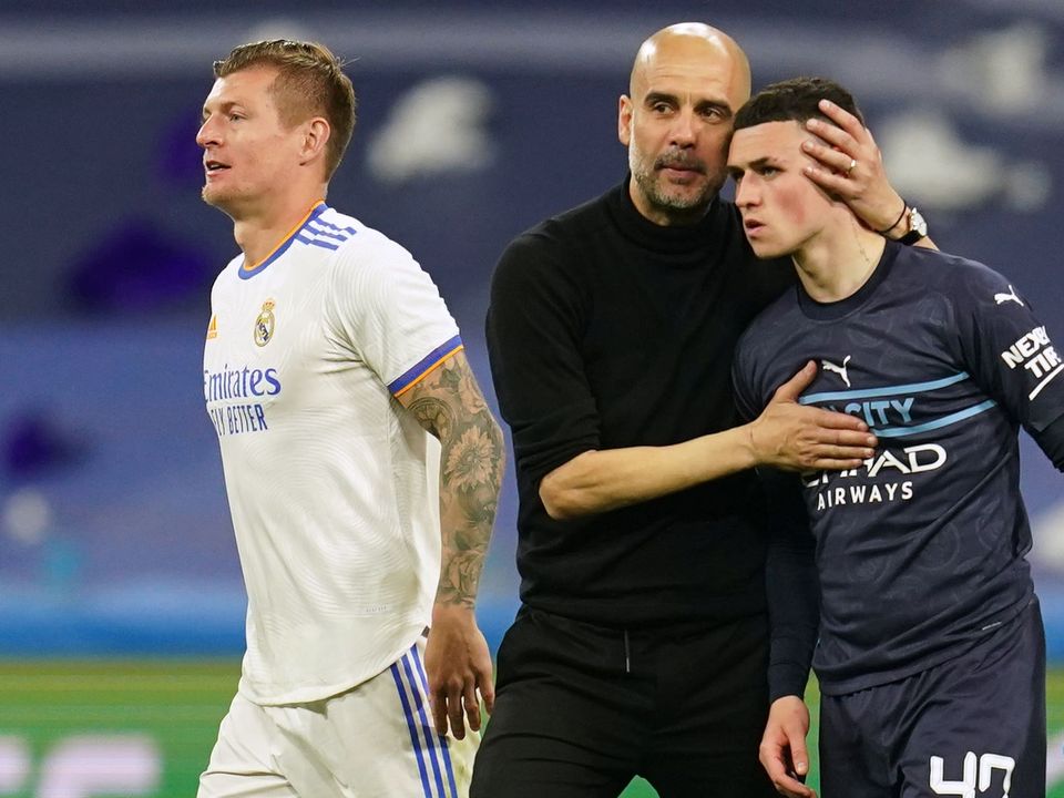 Pep Guardiola, centre, has yet to address the shattering defeat to Real Madrid with his players (Nick Potts/PA)