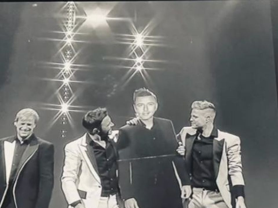 Westlife and a cardboard cut-out of Mark Feehily.