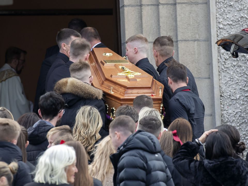 Mourners carry coffin of Tony Dempsey. Photo: Collins Dublin