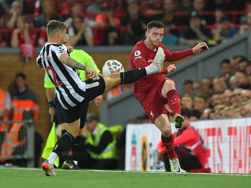 Crunch: Liverpool's Andy Robertson battles with Newcastle United's Kieran Trippier during the Reds' 2-1 win in Anfield in August. Photo: Getty Images