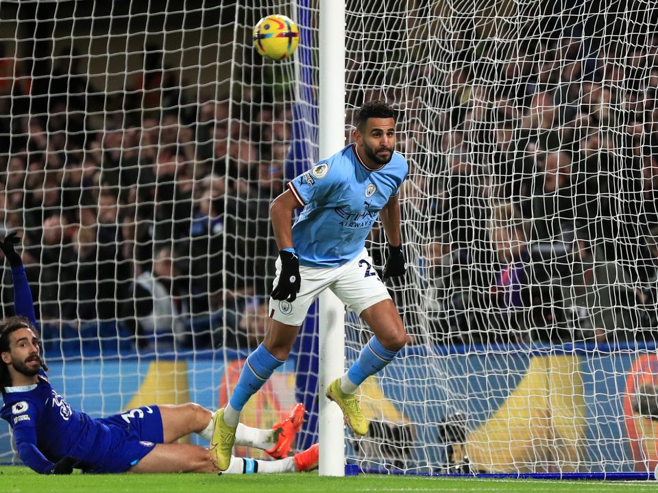 Manchester City's Riyad Mahrez celebrates scoring their side's first goal of the game during the Premier League match at Stamford Bridge, London. Picture date: Thursday January 5, 2023.