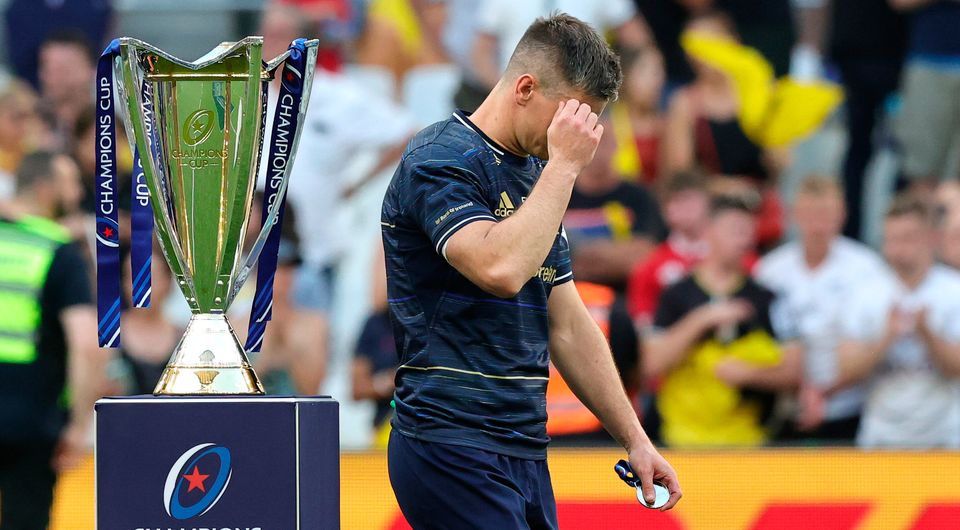 Johnny Sexton of Leinster holds his head as he walks past the Heineken Champions Cup. (Photo by David Rogers/Getty Images)