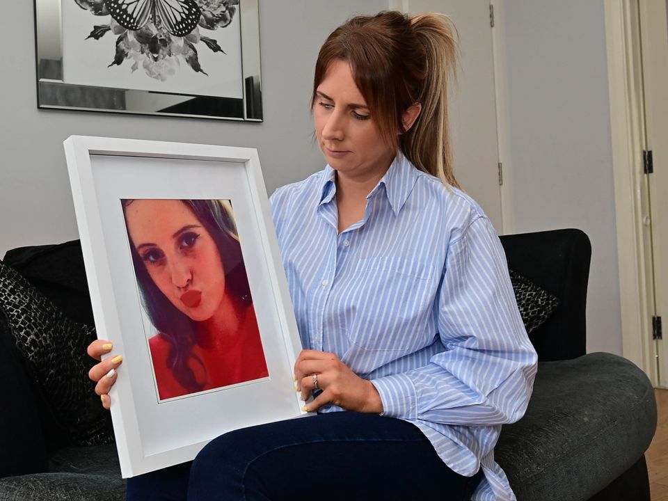 Deborah Hanna with a photo of Caitlin