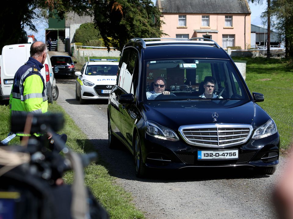 Chrissie Treacy’s body being removed from the scene