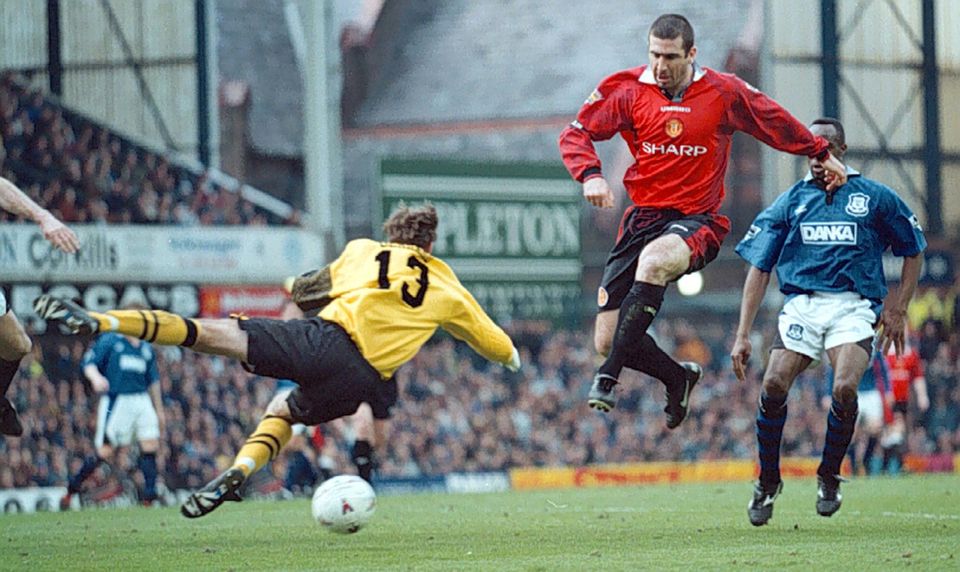 Everton V Man Utd : Manchester Uniteds Eric Cantona slots home his sides second goal, past Everton keeper Paul Gerrard during their FA Carling Premiership match at Goodison Park in 1997. Photo by Dave Kendall/PA.